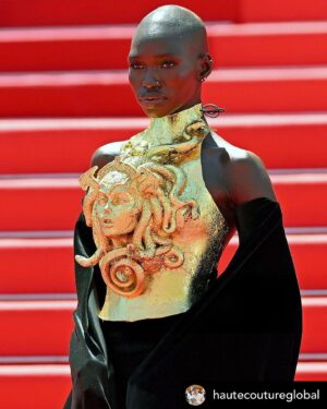 Natalie Haynes Instagram - She makes a mighty Athene! 🦉 
Thanks to @theballgownboy for sending 💛
.
Posted @withregram • @hautecoutureglobal An underrated look from Cannes Film Festival!
Model #MitchellAkat in #HarveyCenit