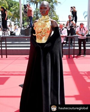 Natalie Haynes Instagram - She makes a mighty Athene! 🦉 
Thanks to @theballgownboy for sending 💛
.
Posted @withregram • @hautecoutureglobal An underrated look from Cannes Film Festival!
Model #MitchellAkat in #HarveyCenit
