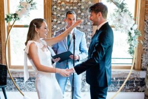 Natasha Bertrand Instagram - Married @bryancoxwell last weekend and had the best party with our family & chosen family at @bigbearcafe 🥰 

Our wedding truly would not have been as special without our supremely talented officiant and friend @dan_the_steele_man, who DEFINITELY DID NOT make me and Bryan cry at the altar with the most thoughtful and hilarious speech — Dan we love you!

thank you to the wonderful @dcbridal for the glam, @libertybakingco for our amazing cake, and @sound.originals for the photos! 🤍