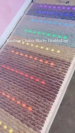 Natasha Slayton Instagram - Words cannot describe how obsessed I am with my new Rainbow Chakra Mat from @healthylineshop .  Pinching myself that I get to represent this incredible brand in both my personal life and business.  I’ve been a fan for such a long time. 🙏💓💫🥳

This baby is filled with pounds of semi-precious gemstones and combined with PEMF therapy, photon light therapy, infrared therapy, negative ion therapy & healing (heated) gemstones. 💫💫💫

Some of the benefits include: Faster Muscle and Injury Recovery, Increased Flexibility, Improved Circulation, Relaxation and Rejuvenation, Grounding, Body and Mind Detoxification, Expanded Awareness & Mental Clarity, pain relief, improved sleep quality, Chakra Balancing and Overall Wellbeing 
———————————————————————

You can click the Link in bio to learn more, and you can use my code NatashaSlayton10 to get 10% off any purchase from the full range of HealthyLine products   free shipping within the US! 

———————————————————————

🙏 @pinktreestudiosla for the beautiful space

#chakras #chakrabalancing #crystalhealing #crystaltherapy #infrared #healthyline