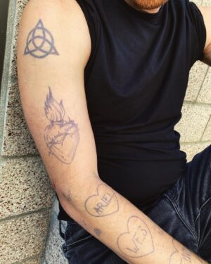 Ned Fulmer Instagram - What do you think of my new tattoos? #charmed