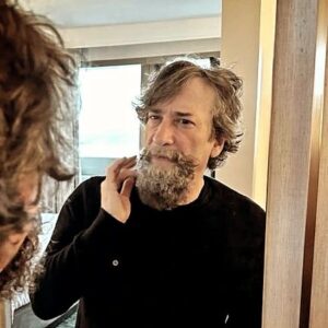 Neil Gaiman Instagram - Today I had the first fitting of the Dickens Beard. It looks incredibly real. Tomorrow it will be worn with hair and clothes and will be very Dickensian indeed. @loryn_pretorius made the beard and applied it and is seen here discussing making me into Mr D tomorrow.

Still a handful of tickets left for Monday and several big handfuls of tickets for Tuesday. NY town hall...