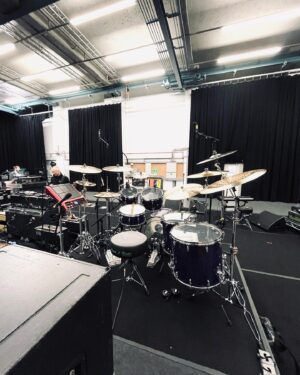 Nic Collins Instagram - ~ New tubs 🫠🟣 A massive thank you to @gretschdrums for making this beauty for me for the upcoming @officialmatm tour! We came up with a custom color way based on their deep black marine pearl finish. We Princed it up to make what I’ve originally named “Purple Marine Pearl” (took me ages to come up with that) 🙃 It sounds amazing and I can’t wait to take it out on the road in a couple of days. And of course, thank you to all my other endorsers; @sabiancymbals, @remopercussion, @promarksticks, @dwdrums, @rolandglobal, and @porter_and_davies. I’m incredibly lucky and honored to be able to play these companies.

Sizes:
- 6.5”x14” Snare
- 18”x22” Kick
- 7”x10” Rack Tom
- 9”x13” Rack Tom
- 16”x16” Floor Tom
- 16”x18” Floor Tom

~