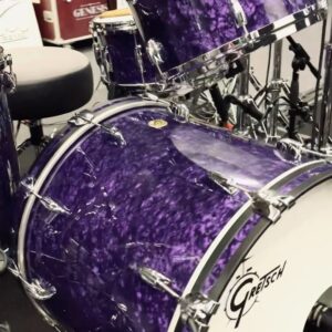 Nic Collins Instagram - ~ New tubs 🫠🟣 A massive thank you to @gretschdrums for making this beauty for me for the upcoming @officialmatm tour! We came up with a custom color way based on their deep black marine pearl finish. We Princed it up to make what I’ve originally named “Purple Marine Pearl” (took me ages to come up with that) 🙃 It sounds amazing and I can’t wait to take it out on the road in a couple of days. And of course, thank you to all my other endorsers; @sabiancymbals, @remopercussion, @promarksticks, @dwdrums, @rolandglobal, and @porter_and_davies. I’m incredibly lucky and honored to be able to play these companies.

Sizes:
- 6.5”x14” Snare
- 18”x22” Kick
- 7”x10” Rack Tom
- 9”x13” Rack Tom
- 16”x16” Floor Tom
- 16”x18” Floor Tom

~