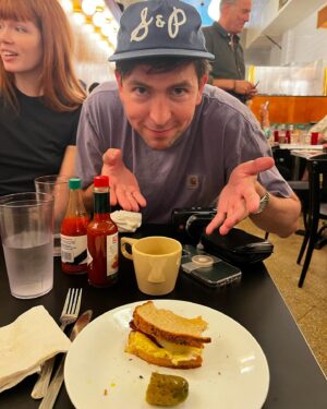 Nicholas Braun Instagram - @sandplunch is officially open for all your tuna melt/pastrami Reuben/pancake/eggs/corned beef hash/chopped liver/matzo ball soup/burger/and more, needs

Huge congrats and thanks to Matt and Eric of @courtstreetgrocers who brought this all into reality and without changing the old, classic Eisenberg’s feel. And Chef Dan Ross-Leutwyler who has made every item on the menu ridiculously good. 

Open 7 days a week, 8a-5p. 

174 5th Ave (22nd St). See you there — 🍽️☕️🥪