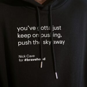 Nick Cave Instagram - #bravehood is a global charity campaign initiated by non-profit organisation @guidinglight.global in partnership with @unicef to support children in Ukraine with food, emergency shelter, healthcare, and psycho-social support. 
Organic cotton merchandise featuring lyrics by Nick Cave can be purchased via the link in the bio, with all net proceeds going to UNICEF’s emergency relief efforts for Ukraine.