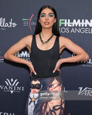 Nida Khurshid Instagram - Honored to receive the Spotlight award at Filming Italy festival, grazie mille @tizianarocca ! Anyone who knows me knows I love Italy dearly, so to be receiving this award in the presence of so many talented Italian artists was truly such a dream 💛🙏🏽 
Styling by @espionagela in vintage @gucci x @unskilledworker 
Makeup/hair by @mua.susie 
BTS photos by @photonathalie