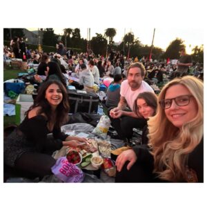 Nikki Griffin Instagram - Another great night at Cinespia watching a movie under the stars with such lovely company! The drone show was so cool and we had all the snacks! 
•
•
•
#cinespia #hollywoodforevercemetery #hollywoodforever