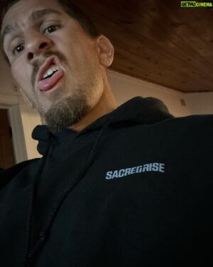 Niko Price Instagram - Thank you @sacredriseofficial for new clothes! Everyone check them out 🙏🏼 #ufc #religion #family