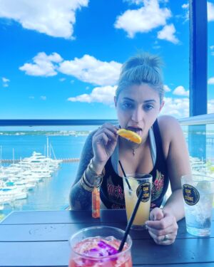 Nora Hewitt Instagram - Can’t take her anywhere…lazy Sunday morning with my beautiful wife 🦈🏝️🍹🌊