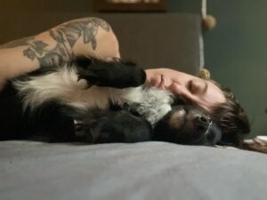 Nora Hewitt Instagram - Sleepy Sunday snuggles with my best little buddy Doc 🐺#ilovemydog #mylittlefox #Doc #blackdogsrule #adoptdontshop #willetman