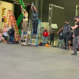 Olivea Morton Instagram - Here is the picture of myself and Uncle Rick that I mentioned in the interview with #EntertainmentRoadmap.  There is also a rehearsal for the fountain stunt where Cassandra is standing in for Walker.  It was my first wirework experience, and now I know how it feels I really want to do more stunts!

The entire crew made sure we were all safe and comfortable at all times.  I had a wetsuit on underneath my wardrobe, and was given all the hot tea, towels and blankets that I needed.  Even my trailer had a fireplace that kept everything nice and cozy!

I’m really happy that they decided to make Nancy and her friends pretty rather than how Percy describes us in the book, even though I was totally up for it!  But if you think about it, it’s written from a twelve year old boy’s perspective, and it makes sense.

Thank you to everyone who has watched the entire interview, I am a talker!  You have given me such wonderful compliments, and it means the world to me!  The entire time was a fantastical experience, one that I will cherish my entire life. 🔱🧡🩵

#rickriordan #nancybobofit #percyjacksonandtheolympians