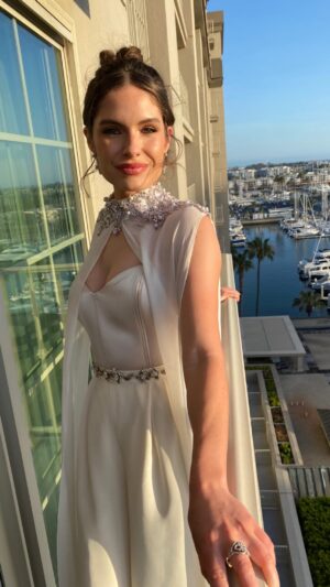 Olivia Grace Applegate Instagram - don’t ya just love a cape moment?🥰 that breeze made for a dreamy red carpet lewk ☁️🧚🏽‍♂️
style @stylelvr 
glam @audurs