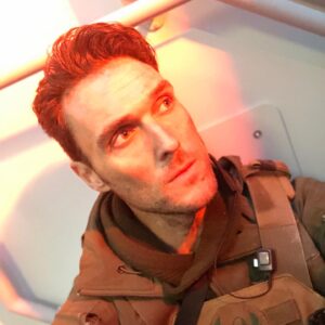 Owain Yeoman Instagram - A little SAS Red Notice bts pic drop to celebrate the launch of the movie in the UK and in anticipation of its US release tomorrow March 16th on demand, Apple TV and @redbox . An epic ride of an action thriller made with some of these lovely folks! #sasrednotice #skytv #skycinema #nowtv #redbox