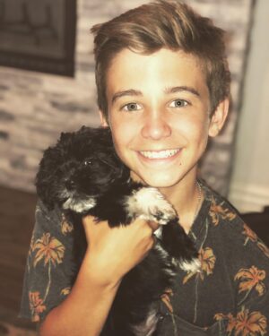 Parker Bates Instagram - Meet the surprise addition!!! Thank you @pawworks for making this spontaneous match!  We are totally obsessed with “puppy no name” and he is fitting right into our family❤️🐾❤️ #adoptdontshop #rescuedogsofinstagram