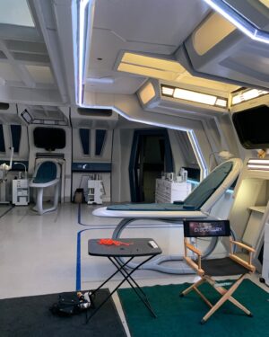 Patricia Summersett Instagram - My equivalent of a yacht selfie? 🖖
 (I’m sailing aggressively in space towards the USS Discovery, do not get in my way. 😈 )

Last week the series finale of Star Trek: Discovery dropped. I squeaked into this  heartfelt series closer S5 Ep 10 “Life, Itself” as the character Primarch Tahal. Directed by Olatunde Osunsanmi, written by Kyle Jarrow and Michelle Paradise. 

It was a privilege to witness the sophisticated artistry of the Discovery costume design team, including artists like @adam_quang and many more — to watch them work together and construct these ornate pieces! My iphone pics don’t really do justice to the craft, but here’s another look at the glorious gilded beast—and proof that I was inside the armour, on the USS Discovery, chillin’ like a villain… because… I am that…here❣️

#startrekdiscovery 
#breen 
#tahal