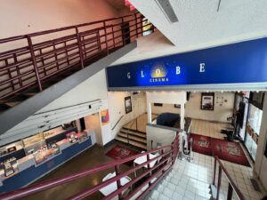 Patton Oswalt Instagram - Just found a little slice of heaven in Calgary. The mighty @globecinema_yyc — my @newbeverly away from home. It’s dingy, it’s gloomy — it’s PERFECT. Non-stop new, fringe, and classic cult cinema. Lumpy seats, mostly-empty auditoriums on a Saturday afternoon. I just watched THE LAST STOP IN YUMA COUNTY (a stunning debut desert noir from @francisgalluppi that’s wall-to-wall tension, violence and beloved character actors! Jim Cummings! Faizon Love! Gene Jones! Robin Bartlett! Barbara Crampton! And the always-epic Richard Brake!) and I’m coming back tomorrow for PINK FLAMINGOS! Watching John Waters’ trash-terpiece on a Sunday afternoon with, I’m predicting, 5 more people is film freak nirvana. Thank you, @globecinema_yyc — for your charming concession stand, your showcasing of indie game designers (you can play as-yet-released games from local designers for FREE!) and your weird, midnight-movies-for-matinee programming style. Breakfast for dinner for sprocket fiends like me. I love you guys.