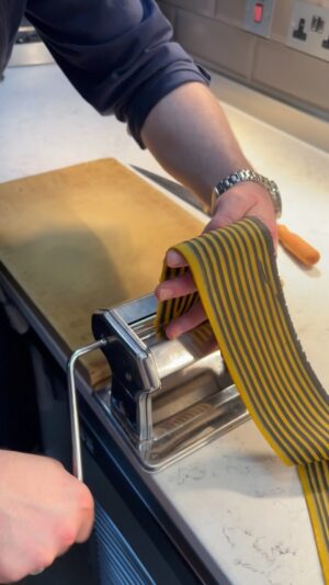 Paul Ainsworth Instagram - Our Pappardelle Ripiene 💥👊🏾

We start, by making a dough, using big, beautiful and very rich @steweeggs. We then add a little charcoal powder to half the batch, turning it black, before merging the two together to create the wonderful striped pattern. Next, we roll the dough out into big sheets, cut into ribbons of pappardelle and stuff with a creamy cheese polenta, that’s finished with aged-Spenwood - an indulgent sheep’s cheese from Berkshire. Lastly, we blanch the pasta and top with slices of preserved black winter truffle and our favourite OMED olive oil. 

We serve this in an onion brodo, made by deeply caramelising Roscoff onions with their skins on and braising them overnight in a kombu stock, allowing a complex bitter-sweet flavour to develop. This is finished with a splash of Champagne and a little Cornish Ramson oil, which we have an abundance of at the moment and due to the short growing season are making the most of. 

Lastly, to showcase the incredible English asparagus we get from St Enodoc, one of the UK’s most respected farms located just across the estuary from @no6padstow, we serve a warm fricassee, with steamed and raw green asparagus, as well as English sweet peas, in a seaweed, black truffle and butter emulsion.