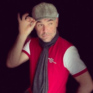 Paul Blackthorne Instagram - Modeling my much appreciated Christmas gifts: Retro Arsenal shirt, Marks&Sparks mottled cap, and nice soft grey scarf.
Happy Camper.
Hope you’re all having a lovely day
X