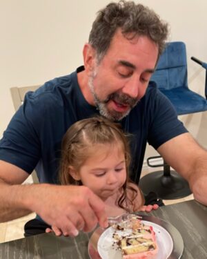Paul Nassif Instagram - Are you more excited for new episodes of Botched on January 18th than we are for this slice of birthday cake?! 😅🎂 #likefatherlikedaughter 

#tbt #throwbackthursday #botched #botchedseasonpremiere #prouddad #girldad #cake #birthdaycake