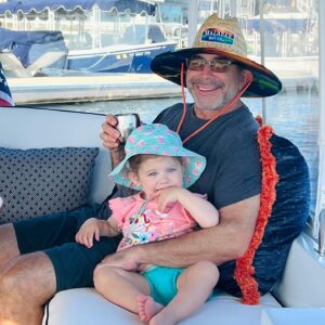 Paul Nassif Instagram - Have A Happy & Safe St. Patrick’s Day! 🍀 For those of you wondering, there is green on our hats. 😅 This was actually taken on Paulina’s first boat ride in California! 

#fbf #stpatricksday #stpatricksdayweekend #girldad #prouddad #weargreen