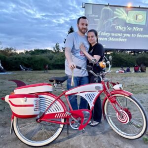 Paul Reubens Instagram - 🚲 "I can't remember a time in my life where a Pee-wee/Paul project wasn't in the backdrop," shares Brandon Hall, who's been stanning Pee-wee his entire life. In childhood, he got his mom to rent 'Pee-wee’s Big Adventure’ many many times. When that video store was going out of business years later, he bought the exact copy of the movie and then had Paul sign it! 📼

🦇 "At 5 years old, I remember being so excited to see ‘Batman Returns’ because TV Guide said Paul had a cameo," he recalls, “I can clearly remember watching it with my dad (before I could read) and insisting that he point out Paul's name in the credits.”

📚 "When I started kindergarten, I was introduced to the school library," Brandon reminisces about discovering 'Big Top Pee-wee' books. These books became a staple of his library visits, eventually gifted to him by the librarian at the end of 6th grade. 

🎭 Seeing Pee-wee live on Broadway, twice!, was a dream come true. "What a thrilling moment in my life," he reflects. You’ll see in his photo that he dressed the part! 🌟

👫 Brandon's passion for Pee-wee extended to those around him. "I've successfully introduced nieces, nephews, cousins, girlfriends, co-workers, and friends to the work of Paul," he says proudly. Meeting Paul at a convention was a highlight, as he felt a genuine appreciation for his fans. 

💌 After meeting Paul, Brandon got a surprise email from him asking for his mailing address. "From Christmas 2017-2022, I received a card from him and looked forward to it every year." 

🧸 "My old Pee-wee pajamas didn't fit anymore and my mom saved them and had them made into a keepsake bear," he shares about a heartwarming and adorable Christmas gift. 🐻

💍 Lastly, Brandon’s story takes a romantic turn with his engagement this summer at a drive-in during 'Pee-wee's Big Adventure.' "I popped the question over the radio while she was sitting in the car," he recalls. A perfect proposal for a lifelong fan. 🎥💕

Today’s Secret Word, as chosen by Brandon, is #YEAR! You know what to do when you hear the Secret Word, right? 😱😱😱

#PeeweeForever