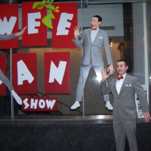 Paul Reubens Instagram - 🚲 "I can't remember a time in my life where a Pee-wee/Paul project wasn't in the backdrop," shares Brandon Hall, who's been stanning Pee-wee his entire life. In childhood, he got his mom to rent 'Pee-wee’s Big Adventure’ many many times. When that video store was going out of business years later, he bought the exact copy of the movie and then had Paul sign it! 📼

🦇 "At 5 years old, I remember being so excited to see ‘Batman Returns’ because TV Guide said Paul had a cameo," he recalls, “I can clearly remember watching it with my dad (before I could read) and insisting that he point out Paul's name in the credits.”

📚 "When I started kindergarten, I was introduced to the school library," Brandon reminisces about discovering 'Big Top Pee-wee' books. These books became a staple of his library visits, eventually gifted to him by the librarian at the end of 6th grade. 

🎭 Seeing Pee-wee live on Broadway, twice!, was a dream come true. "What a thrilling moment in my life," he reflects. You’ll see in his photo that he dressed the part! 🌟

👫 Brandon's passion for Pee-wee extended to those around him. "I've successfully introduced nieces, nephews, cousins, girlfriends, co-workers, and friends to the work of Paul," he says proudly. Meeting Paul at a convention was a highlight, as he felt a genuine appreciation for his fans. 

💌 After meeting Paul, Brandon got a surprise email from him asking for his mailing address. "From Christmas 2017-2022, I received a card from him and looked forward to it every year." 

🧸 "My old Pee-wee pajamas didn't fit anymore and my mom saved them and had them made into a keepsake bear," he shares about a heartwarming and adorable Christmas gift. 🐻

💍 Lastly, Brandon’s story takes a romantic turn with his engagement this summer at a drive-in during 'Pee-wee's Big Adventure.' "I popped the question over the radio while she was sitting in the car," he recalls. A perfect proposal for a lifelong fan. 🎥💕

Today’s Secret Word, as chosen by Brandon, is #YEAR! You know what to do when you hear the Secret Word, right? 😱😱😱

#PeeweeForever