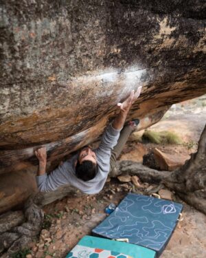 Paul Robinson Instagram - Ménage à trois, 8B /V14. Such a sick one. Two super hard moves that guard an easy bulge top out finish. I figured out the first move quickly and then it took me a bit to figure out how I wanted to place my heel for the big lock off move! Psyched to finish this one off! This climb had been on my list of boulders I wanted to do after seeing the video of the first ascent a few years back! Big hike to good hope tomorrow 💪💪 #bouldering photo: @lizzy.ellison