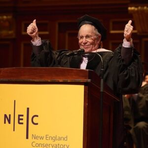 Paul Simon Instagram - Congratulations to the 2024 graduating class of @necmusic!

On Sunday, Paul was honored to address the students in a commencement speech, and to be presented with the honorary degree, Doctor of Music, quoting: 

“It’s a cliché but music really is the closest we come to a universal language. It crosses borders as effortlessly as a cloud. It nourishes culture like an underground spring. Music has the power to heal, to inspire, to make people weep or jump up and dance for joy. You have chosen a profession that can provide a lifetime’s journey into the ineffable.”