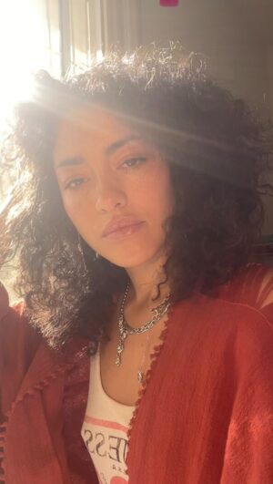 Paulina Singer Instagram - I really try to make these like sweet and relaxing but I am sort of out of control so it is what it is. 

How yall doing today though?
.
.
.
Red cardigan from @aya_sacredwear 🪔

 #xoxosapiona #uplifting #affirmations #prepareforthebest