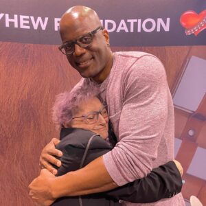 Peter Mayhew Instagram - You never know who you’ll run into at @SW_Celebration - Book of Boba Fett’s Carey Jones (Krrsantan) got a Wookiee sized hug from Angie Mayhew. #StarWarsCelebration