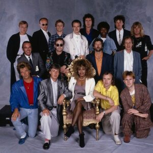Phil Collins Instagram - Phil pictured amongst music royalty in this promo shot for The Princes Trust 10th Anniversary record. 

Can you name all the artists in this photo?

#tbt