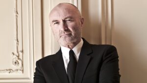 Phil Collins Instagram - Happy New Year everyone! Here’s to 2024 🥂

Photo by Neale Haynes