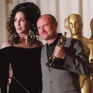 Phil Collins Instagram - Today is the #Oscars ceremony! Pictured is Phil with Cher, who presented him his “Best Original Song” award for “You’ll Be In My Heart” on the night in 2000 🏆