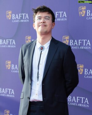 Phil Wang Instagram - Thank you @bafta for letting me present the 2024 BAFTA Games Awards. What a thrill and privilege for someone who always told his parents games were art actually. Got to meet the original Lara Croft (Shelley Blond), Max Payne’s face (@samlakewrites), and even got to do the Spidermen meme with two actual Spidermen (@yurilowenthal @officialnadjijeter).

Congratulations to all the winners and nominees. What a dream of a night!

📸: @alexingramphoto @bafta