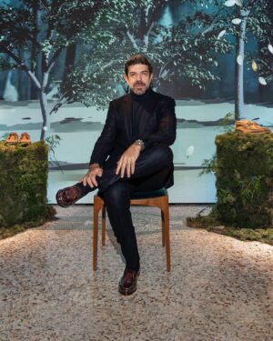 Pierfrancesco Favino Instagram - @pierfrancescofavino graced the exclusive #SantoniFW24 Men's preview at #MFW in impeccable style, making a statement in the iconic, sophisticated #SantoniAndrea loafer. 
 
#Santoni #SantoniMagicMountains #adv