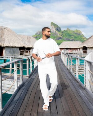 Pierre Abena Instagram - If the dress code is “resort casual”… count me in! 🏝️🤍 The views and water in Bora Bora were just unreal… I’m ready for some summer travels and scuba diving in the crystal blue waters! 🤿🪸Where is your next travel destination?? 
📸 @vincentbrossaultphoto 
.
.
.
.
.

#travel #boraboraisland #boraboraresort #fourseasonsborabora #turqoisewater #traveladdiction #destinationphotographer #crystalbluewater #bestbeaches #pierreabena #ocho #vacationstyle #allwhiteoutfit #scubadivinglife