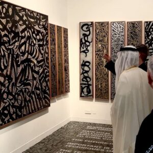 Pokras Lampas Instagram - Сегодня я начинаю рассказывать о своем проекте для Sharjah Calligraphy Biennial 2022 — которая в этом году проходит под темой "Elevation" и является 10-й по счету.

Мой проект — большое исследование современной каллиграфии, в котором представлено 27 работ под общим названием [ General Modern Calligraphy Styles & Scripts Research ], и аббревиатуой GMCSSR.

Подробнее о выставке я расскажу позже, а сейчас хочу представить одну из главных работ этой экспозиции — «Elevation: Traditions & Modern».

Работа написана в уникальной технике. Она создана при помощи эпоксидной чёрной краски. Это краска имеет свойство затвердевать через полтора часа после того, как смешиваются компоненты, и поэтому каллиграфия на двухметровом холсте пишется в очень интенсивной технике письма без права на ошибку, паузы или доработки потом. 

Нужно контролировать кисть, композицию, плотность краски на инструменте. И при этом понимать, что краска с каждой минутой становится всё более неподходящей для каллиграфии, это интересная проверка на мастерство и сосредоточеность.

При этом у работы есть ещё один слой - это очень тонкая выверенная золотая каллиграфия, которая писалась на протяжении недели в мастерской на Бали.

Процесс письма был для меня процессом медитации, поиском новых форм букв, которые вплетаются в пространство между чёрным и белым, между поверхностью самого полотна и каллиграфией, которую я создал в предыдущем этапе.

Не терпится поделиться с вами всей серией — а если вы в Арабских Эмиратах, то Биеннале можно посетить до 8 ноября в Sharjah Art Museum.