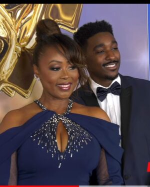 Ptosha Storey Instagram - About last night …. Had a marvelous time at the 49th Annual Daytime Emmys creative arts and lifestyle ceremony .  I felt like a QUEEN walking the  Red carpet as an Emmy Nominated Actress and so proud to have my handsome son @jordanljones by my side . Thank you to @sptv @cbstv @youngandrestlesscbs,  my family , my village and my fans . This journey would not be possible without you . Special shout to my glam squad for making me look beautiful on this special day . (Swipe)

Stylist @jlynnstyle18 
MUA @avonna_sunshine 
Hair @michellecoronahair 

#grateful