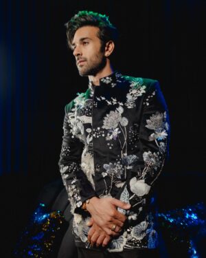 Pulkit Samrat Instagram - My journey to the altar was nothing short of a fairy tale, ignited by a single phone call to my dear friend @theanisha , which was filled with screams of excitement over the news of my upcoming wedding. Despite the absence of a set venue or date, I was unequivocally certain about one thing: my attire would be crafted by the incomparable Anamika Khanna. Our adventure began in the opulent @anamikakhanna.in Mumbai store, amidst the men’s section, but it was in the women’s section where we found our muse—a stunning piece of embroidery that captured my heart and set the theme for my wedding ensemble.

Anamika wasn’t the only magician behind my wedding wardrobe. For the Mehendi ceremony, @farazmanan was the clear choice. Despite his hectic schedule and the collection still being under development, Faraz crafted a breathtaking olive green outfit for me, allowing me to be the first to showcase his new collection. His dedication was a gift I couldn’t have been more grateful for.

As the wedding approached, the need for a Cocktail/Sangeet outfit became urgent. With just a week to spare, we were struggling to find someone who could encapsulate the essence of “shimmer” I desired. It was then that I was introduced to @rahulmishra_7 , and through the efforts of the wonderful Divya, I was adorned in an outfit that radiated shimmer and elegance, surpassing all expectations.

The Black Tie event demanded nothing less than perfection. Rohit Gandhi & Rahul Khanna were the craftsmen of choice for my tuxedo, presenting me with an array of swatches and patterns, making the selection process delightfully challenging. Surrendering to their expertise, the final piece was nothing short of spectacular, becoming one of my favorite looks. @rohitgandhirahulkhanna 

Anamika Khanna didn’t just stop with the wedding outfit; she designed my haldi and both my grah pravesh outfits, sealing my admiration for her forever.

Reflecting on my wedding journey, I’m overwhelmed with gratitude for these fashion pioneers who turned my dreams into reality. Their passion, creativity, and dedication made me the happiest groom alive. My heart is full, and wardrobe, a testament to their genius. 💓🕺