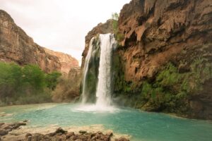 Punarnavi Bhupalam Instagram - This 3 day backpacking trip to Havasupai is a core memory for me. 
.
.

Reaching Havasupai involved a hike of around 10 miles (16 km) from the Hualapai Hilltop trailhead. The trail descends into the Grand Canyon, leading to the Havasu Creek and the Havasupai Reservation. Along the way, we encountered stunning landscapes, waterfalls, and the famous turquoise-blue waters of Havasu Falls, Mooney Falls, Beaver Falls and a lot more. It’s a challenging but incredibly rewarding adventure, It was my first ever proper backpacking trip too
.
.
In three days at Havasupai, we hiked over 50km. Thriving beyond my comfort zone, I found my stride, pushing upward, conquering rugged terrain, and discovering strength and resilience with every step.
.
.
.
I wouldn’t have completed this without the Havasu gang 🫂