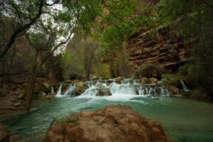 Punarnavi Bhupalam Instagram - This 3 day backpacking trip to Havasupai is a core memory for me. 
.
.

Reaching Havasupai involved a hike of around 10 miles (16 km) from the Hualapai Hilltop trailhead. The trail descends into the Grand Canyon, leading to the Havasu Creek and the Havasupai Reservation. Along the way, we encountered stunning landscapes, waterfalls, and the famous turquoise-blue waters of Havasu Falls, Mooney Falls, Beaver Falls and a lot more. It’s a challenging but incredibly rewarding adventure, It was my first ever proper backpacking trip too
.
.
In three days at Havasupai, we hiked over 50km. Thriving beyond my comfort zone, I found my stride, pushing upward, conquering rugged terrain, and discovering strength and resilience with every step.
.
.
.
I wouldn’t have completed this without the Havasu gang 🫂