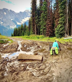 Quinn Brett Instagram - Felt cute. Might delete later.  #tourdivide 
.
.
.
@adidasterrex #impossibleisnothing 
.
.
.
.
.
.
Image description: an adaptive mountain biker is stuck in a giant pool of thick mud on her three-wheeled hand cycle. Mountain peaks in background. 
 .
#climbing #rockclimbing #enduranceathlete #skiing #mountains #mountainbiking #trailrunning #running #roadbiking #crossfit #yoga #paragliding #outdoors #athlete #spinalcordinjury #spinalcordresearch #paralyzed  #protectpubliclands #nationalparks #summitsforall #wilderness #disability