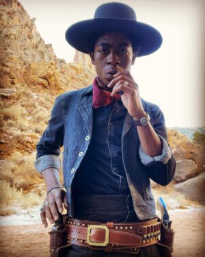 RJ Cyler Instagram - Bloody arm Jim 😈💪🏾
.
..
.
.
.

." Im lighting with the blam blams".
.
.
.
.
.
.
.
.
.Thank you to everyone for supporting!! I love you bada$$es so much 💙💙💪🏾💪🏾🤠🤠😁. Lets keep running it up! 💪🏾😈
.
.
.
.
History💪🏾💪🏾💪🏾
.
.
 * @netflixfilm
 * @strongblacklead
 * @idriselba 
 * @zaziebeetz 
 * @iamreginaking 
 * @lakeithstanfield3 
 * @authenticdelroy
 * @iamedigathegi 
 * @deoncole 
 *  @danielledeadwyler
.
.
.
.THE HARDER THEY FALL 🤠.
.
.
 
.
.
.NOW STREAMING 🚨 #thehardertheyfall