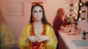 Rachel Alig Instagram - Giant, orange sunglasses. Check. Sequined, sparkly top. Check. Yellow rain jacket. Check. Orange, diamond-shaped earrings. Check. False eye-lashes. Check. Let the week commence.

Photo from the commercial I did for @fanciico thanks to the EPIC team of @baconandeggsmedia @kiazomorrodi @quinnyboy5