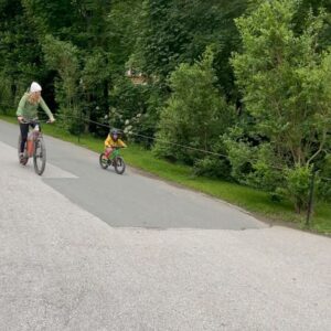 Rachel Atherton Instagram - LEOGANG ❤️🤩🙏🏽👍 we had SUCH a good time, coming on holiday to watch a World Cup was actually so good! Meeting loads of you guys, and
 I got to do a bit of commentary which was so fun 🙏🏽 & hang out with my girl in the most epic place & watch her bike skills progress and buy her a full face helmet & she looks so cute in it 🥰😂

and then watch the World Cup race!
 So so good :-) 
We don’t want to leave this place - it’s so nice to experience these venues in a different way to when I was racing! 
YouTube vlog dropping tomorrow 🥰😜
.
@biohotelrupertus thank you so much ❤️
@bikeparkleogang ❤️
@redbulluk 
@athertonbikes
