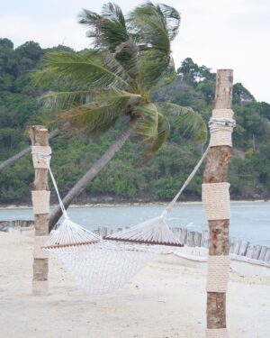 Rachel Melvin Instagram - First official day on #PhiPhiIsland

Photo 1 - after our #sunset #hike through the #forest we found ourselves at #NuiBeach just in time for everyone else to have left. Me in my favorite @averieofficial swimsuit

Photo 2 - the rooms of our hotel @saii.phiphiislandvillage are all bungalows. By far one of the best hotels we’ve ever stayed in from the #design and #architecture, to the amenities and incredibly hospitable staff @kraicheleann @sajones6304 

Photo 3 - exploring the grounds of our ocean front resort #saiphiphivillage early in the morning

Photo 4 - we discovered the hotels #loveTree adorned with trinkets from the gift shop of people celebrating honeymoons, anniversaries, and friendships. Each heart has a hand written message from various guests and we, of course, eventually added our own. 

Photo 5 - their swim up bar in the #funPool was our first stop

Photo 6 - trying the famous #thai #MangoStickyRice at one of the hotel’s 5 restaurants, was our second

Photo 7 - View from our hike coming out of the #forest onto Nui Beach

Photo 8&9 - #Longtail boats parked on Nui beach waiting for their passengers to return from their drop.

Photo 10 - @thekevinbarrett and me on Nui Beach at sunset.

#honeymoon #honeymooninthailand #thailand #thailandtravel #nuibeach  #phiphiisland #thai #thaifood #thailandresort #thailandresorts #thailandhotels #honeymoonhotel #adventure #honeymoondestinations #thailandhoneymoon #phiphiislandresort #phiphiislandhotel