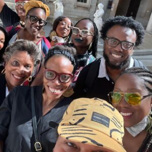 Radha Blank Instagram - And that’s a wrap on #wegoodthx for @metcostumeinstitute #inamericamet exhibit! 

Thanks to Andrew Bolton and The Met for this distinguished invitation. Thanks to all of the Met staff and artisans who helped me bring this vision to life (see previous posts) 

Dedicating THIS post to all my wonderful friends and family who always come out to support and who in this epic moment for me as an artist- (in the absence of my parents), have really become a life line. MY FRAMILY.  Love you guys! 

A very special thank you to my best friend, favorite artist, art teacher and co-conspirator, my mother #carolblank who always encouraged my big creative visions and who, (with my only having a few weeks to execute this baby) clearly planted the seed for this idea from on high! What a wonderful gift for our bday month! Thanks Mommy! We did it! 

Proud moment was to get to share this with my nieces and nephews. I hope your auntie inspires you as much as I embarrass you. 😘❤️🤣

#carolsdawta #rajasgal #carolblank #radhablank #blackwomenartists #lookma #lookmommy #twinlibras #924