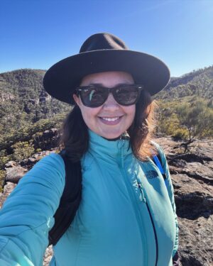 Rae Johnston Instagram - The sun and moon sharing the sky, sandstone paths, grass trees, huge ancient cliff faces, and that beautiful river flowing in the deep valley below 🤎 

Today’s walk on Wiradjuri, Darug & Gundungurra Country - making the most of the clear skies while they last, looking wet and below freezing next week! 

#bluemountains #rigbyhill #piercespass #wiradjuricountry #darugcountry #gundungurracountry