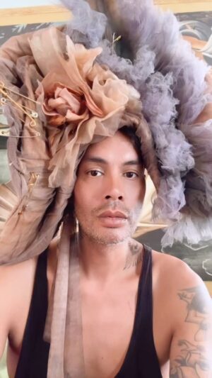 Raja Gemini Instagram - Felt romantic, so I made a thing to wear on my head. Thank you @theballgownboy for the amazing  diaphanous architectural sepia print magic! Which inspired me to make the hat and use the color scheme as direction.